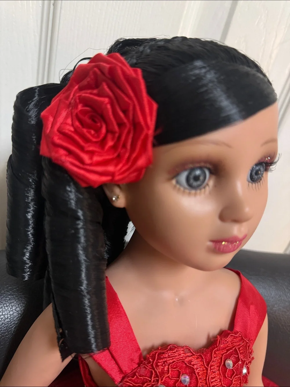 24-inch Quinceañera Keepsake Doll Wearing A Layered, sparkly Red Gown.